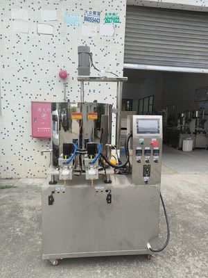 Máquina de llenado de doble cabeza de servo para cremas 5KW 80L Volumen del tambor